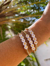 gold filled beaded bracelet with word shine