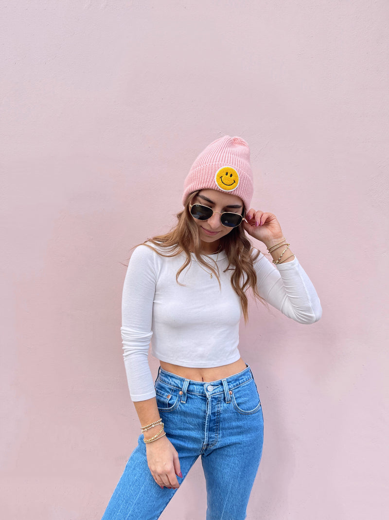 blush pink smiley face beanie