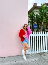 womens pink and red colorblock sweater